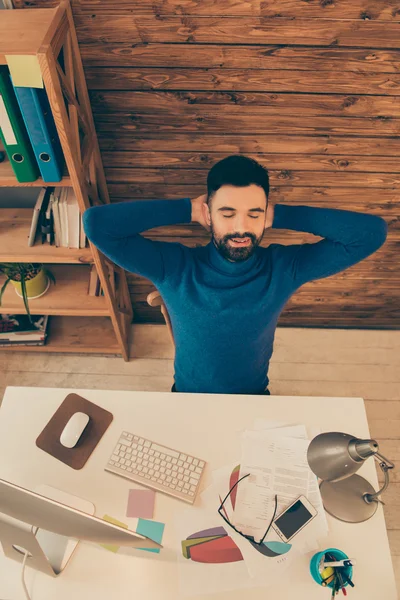 Top view of tired young man having break and sleeping — Stock Photo, Image