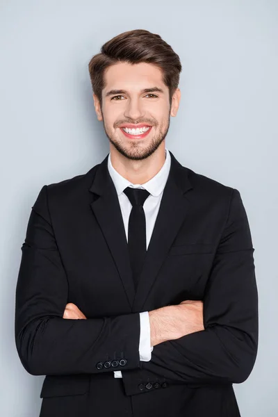 Portrait of happy successful man in suit with crossed hands — Stock Photo, Image