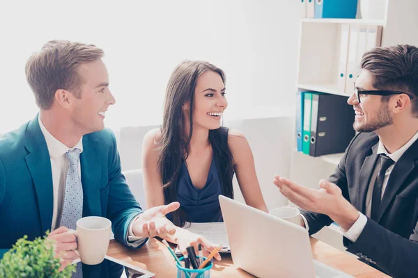 Group of businesspeople talking about future project and smiling — Stock Photo, Image
