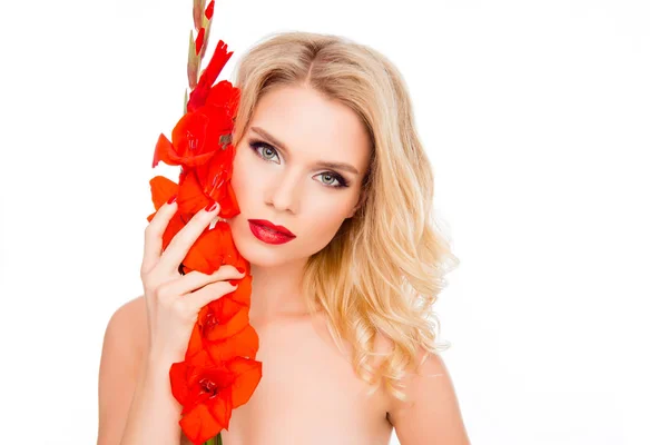 Elegant pretty blonde with red lips holding gladiolus — Stock Photo, Image