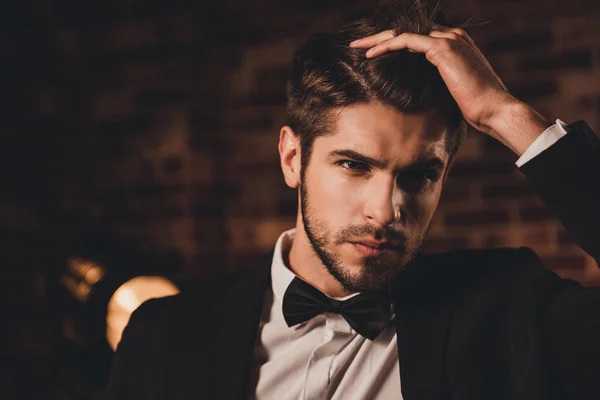 Portrait of confident sexy businessman touching his hair — Stock Photo, Image