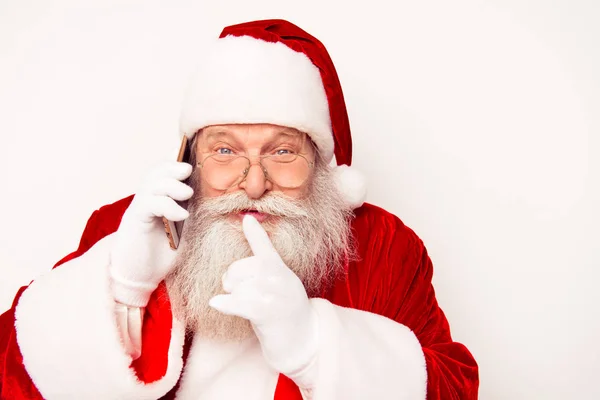 Portrait of happy Santa Claus talking on phone and showing shh g — Stock Photo, Image