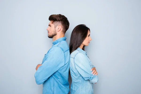 Two serious business coleagues standing back to back — Stock Photo, Image