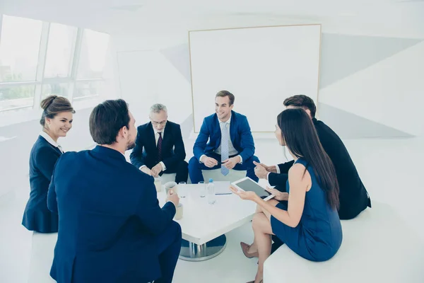 Group of business people discussing financial ideas for future p — Stock Photo, Image