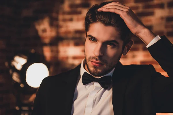 Portrait of handsome young sexy groom  touching his hair — Stock Photo, Image