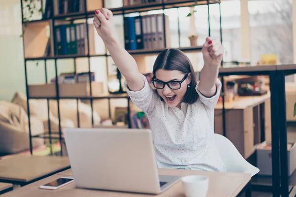 Happy excited successful businesswoman triumphing in office — Stock Photo, Image