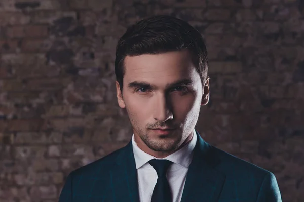 Portrait of handsome young rich man wearing black suit — Stock Photo, Image