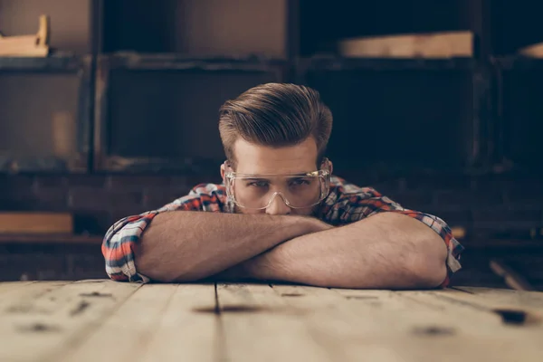 Closeup photo of serious handsome joiner look at camera near tab — Stock Photo, Image