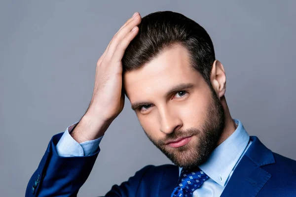 Close up portrait of serious handsome man in blue suit and tie t — Stock Photo, Image