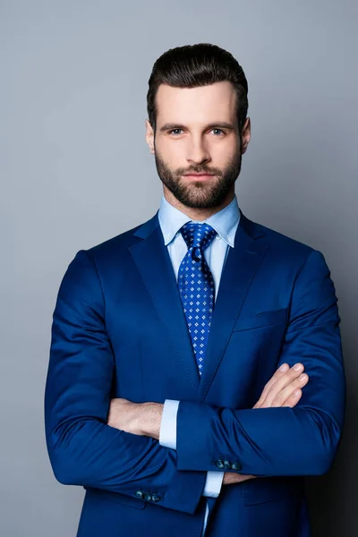 Portrait of serious fashionable handsome man in blue suit and ti — Stock Photo, Image