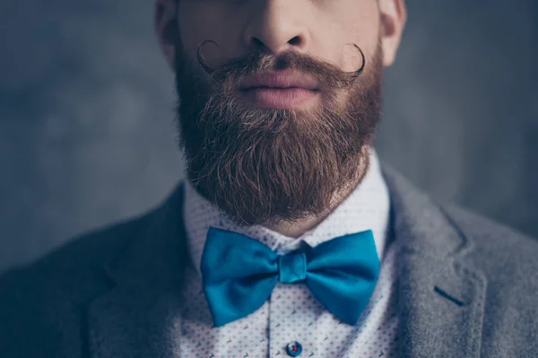 Close up cropped photo portrait of stylish hipster brutal young