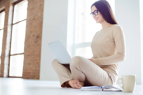 Side view portrait of young charming smiling woman in glasses si — Stock Photo, Image