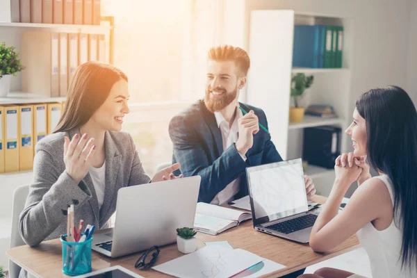 A group of cheerful successful young people discussing business — Stock Photo, Image