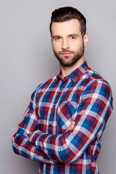 A semi portrait of serious young freelancer in checkered shirt s — Stock Photo, Image