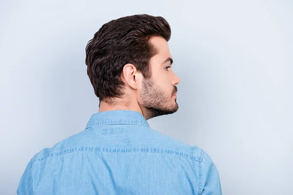 Back view of stylish young brunet man with modern hairstyle on l — Stock Photo, Image