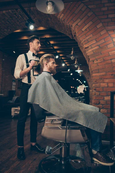 Full length of handsome classy dressed barber shop stylist, who — Stock Photo, Image