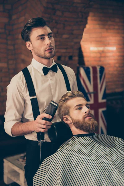 Styling for a handsome young guy. Barber shop hairdresser is att — Stock Photo, Image