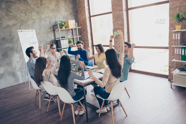 We are the champions! Successful business team with raised up ha — Stock Photo, Image