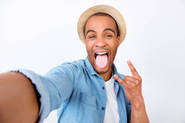 Rock n roll babe! Attractive young mulatto mixed raced guy is po clipart