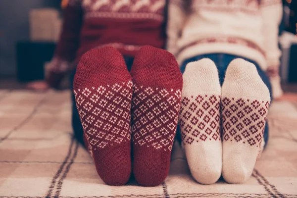 Close up low angle of focus on two pair of feet of festive husba — Stock Photo, Image