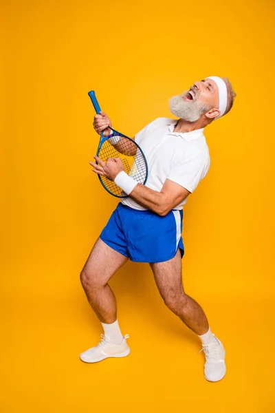 Full length of sexy emotional cool pensioner grandpa practising — Stock Photo, Image