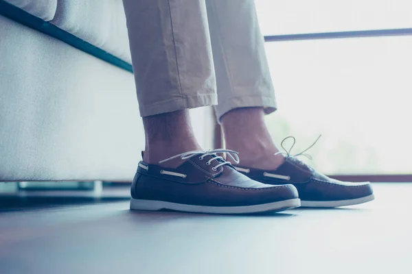 Portrait of legs with modern, fashionable men's shoes with shoel