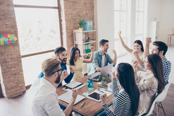 Close up of successful team of business partners with raised up — Stock Photo, Image