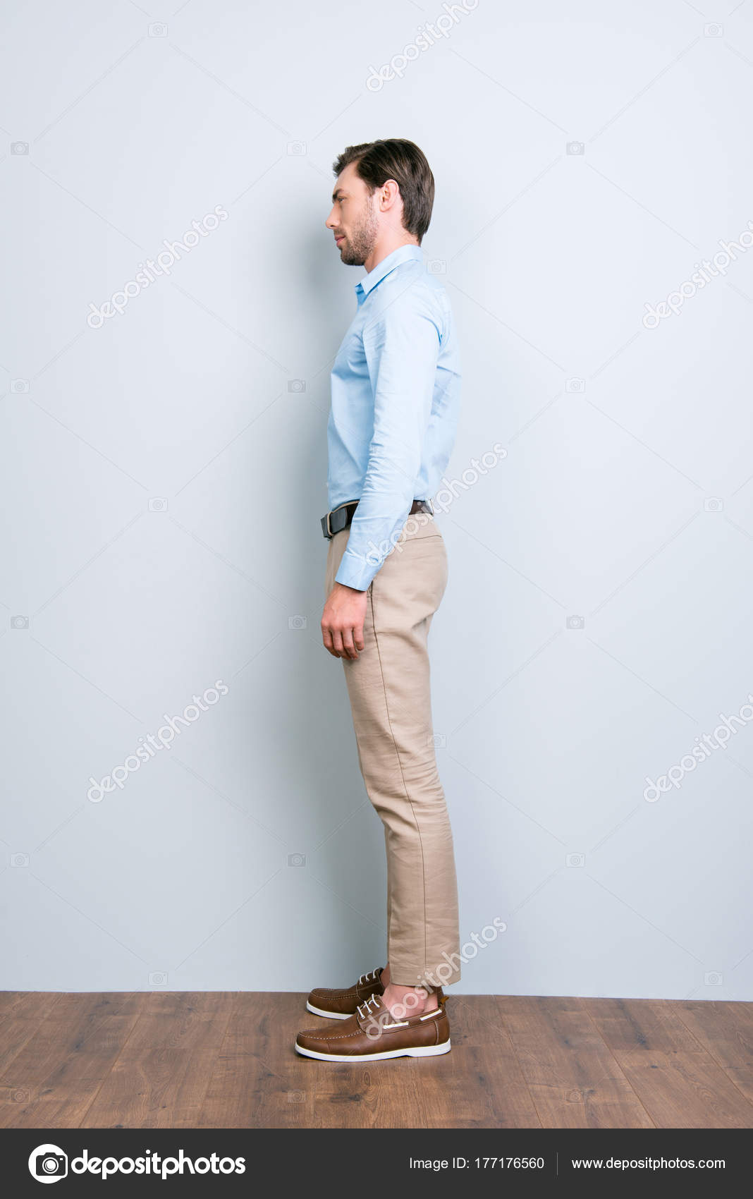 light blue shirt with beige pants