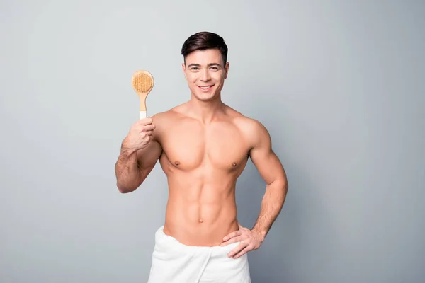 Handsome cheerful joyful healthy guy with white towel on hips is — Stock Photo, Image