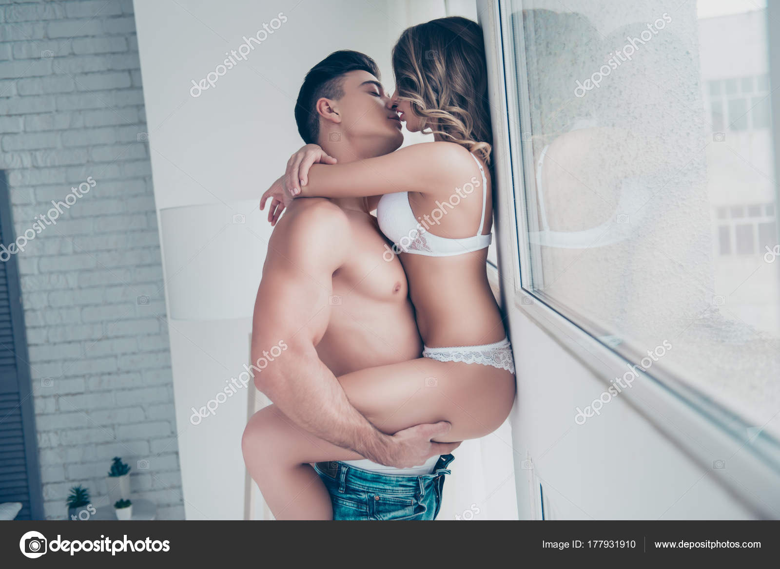 Side view of beautiful obsessed husband and wife, young brunet m Stock Photo by ©deagreez1 177931910