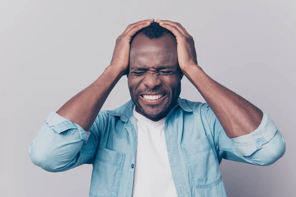 Close up portrait of upset nervous frustrated scared man holding — Stock Photo, Image