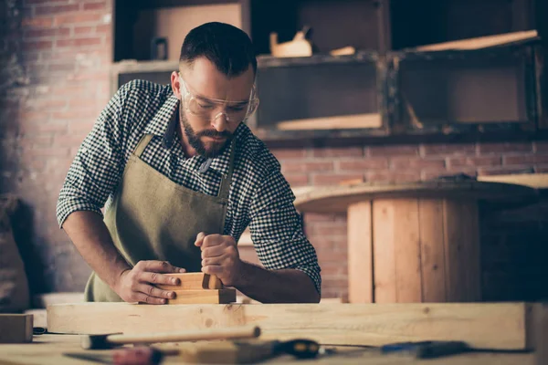 Confident successful concentrated gifted bearded woodworker clot — Stock Photo, Image
