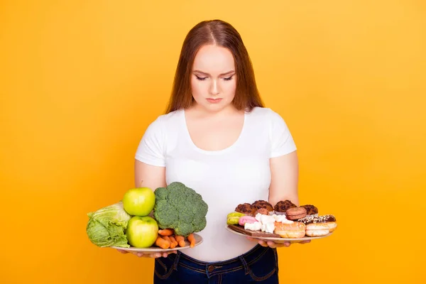 Confused sad upset woman wearing white tshirt can't make a choic — Stock Photo, Image