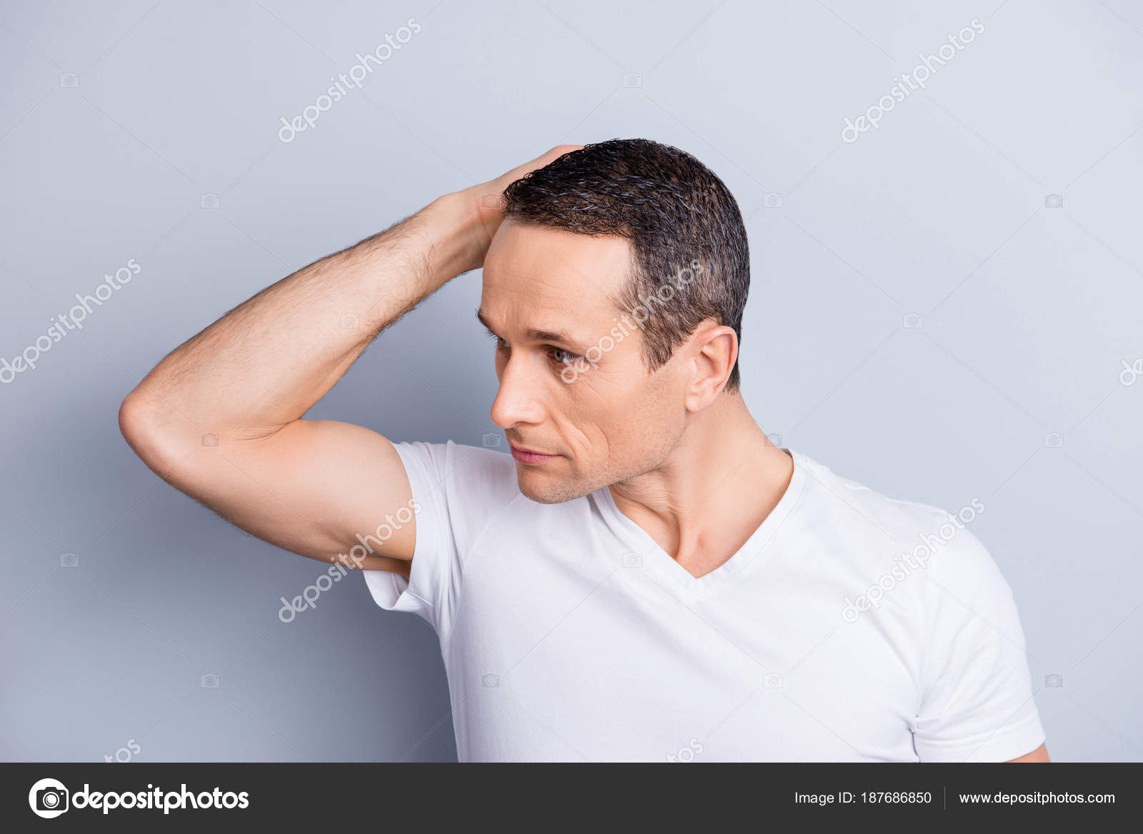 Man with his head turned Man with his head turned