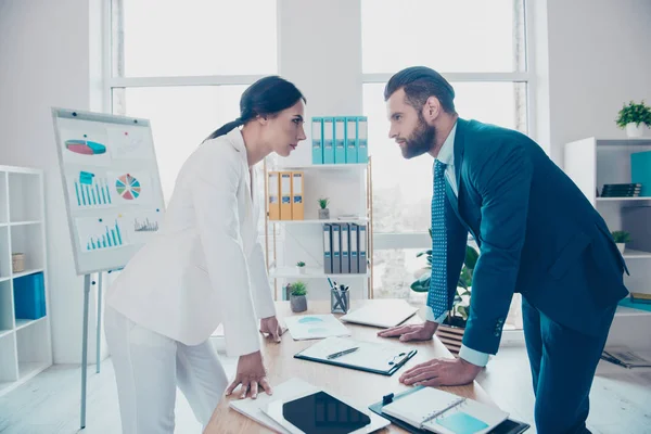 Business competition, side view profile of two colleagues in cla