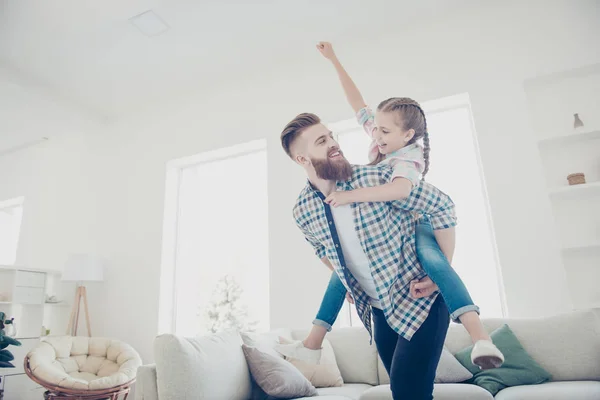 Cheerful father carrying on back little playful joyful kid with — Stock Photo, Image