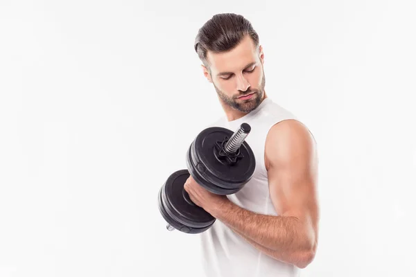 Successful, attractive, sporty, athletic person lifting weights — Stock Photo, Image