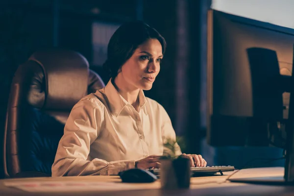 Close-up portrait of her she nice attractive gorgeous lovely charming focused busy lady copywriter typing creating presentation report analysis at night dark workplace workstation indoors — Stock Photo, Image