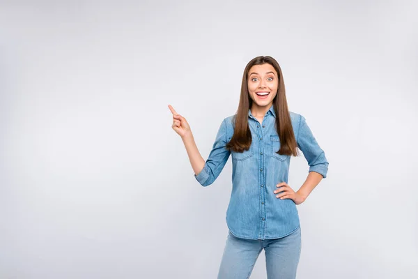 Portrait of amazed funny funky girl impressed look wonderful news about discounts promo point index finger indicate present wear casual style outfit isolated over white color background — Stock Photo, Image