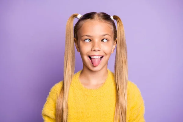 Photo of cheerful funny ridiculous girl sticking her toungue out making eyes look at each other isolated violet pastel color background — Stock Photo, Image