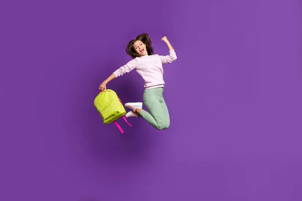 Full length body size view of nice attractive satisfied cheerful cheery glad girl jumping celebrating perfect attainment isolated on bright vivid shine vibrant purple violet lilac color background — Stock Photo, Image