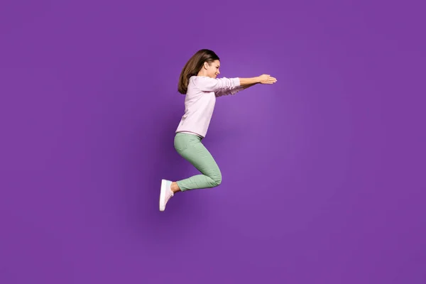Profile side view of her she nice attractive charming lovely cheerful cheery girl jumping pretending diving isolated over bright vivid shine vibrant purple violet lilac color background — Stock Photo, Image