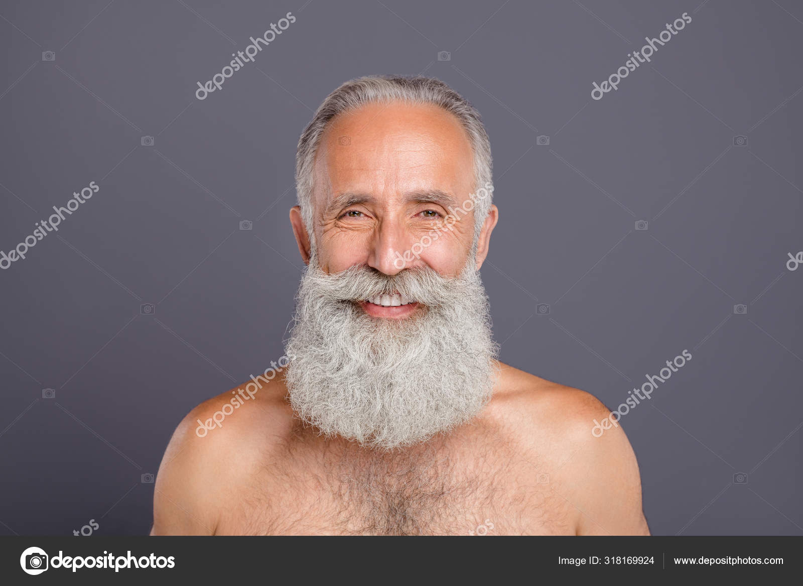 Closeup photo of aged handsome man amazing neat long beard after styling  salon nice result strong naked shoulders shirtless isolated grey background  Stock Photo by ©deagreez1 318169924