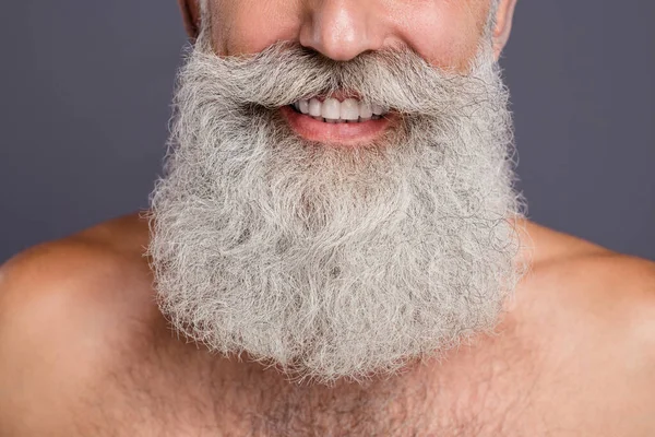 Cropped close up photo of cheerful attractive handsome well old man showing his teeth surrounded with beard isolated grey color background — Stock Photo, Image