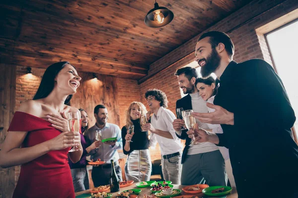 Portrait of nice attractive charming lovely cheerful cheery glad guys meeting corporate event enjoying festal day tradition together talking at modern industrial brick wood loft style interior house — Stock Photo, Image