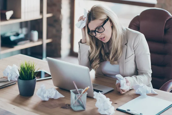 Photo of beautiful business lady looking notebook watching screen listen online report deadline crumple wrong papers sit chair formalwear blezer job place office — Zdjęcie stockowe