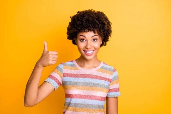 Close-up portrait of her she nice attractive cheerful cheery content glad wavy-haired girl showing thumbup advert ad decision isolated over bright vivid shine vibrant yellow color background — Stock Fotó