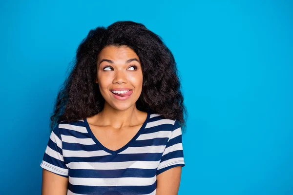 Close up photo of inspired cheerful positive afro american girl feel hungry dream think about tasty delicious yummy food ice-cream wear good looking outfit isolated over blue color background — Stock Photo, Image