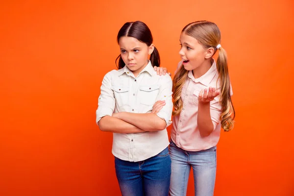 Dont worry relax blonde hair kid girlfriend support latin schoolgirl cross hands frown face feel anger emotions disagree with family classmates wear white shirt isolated orange color background