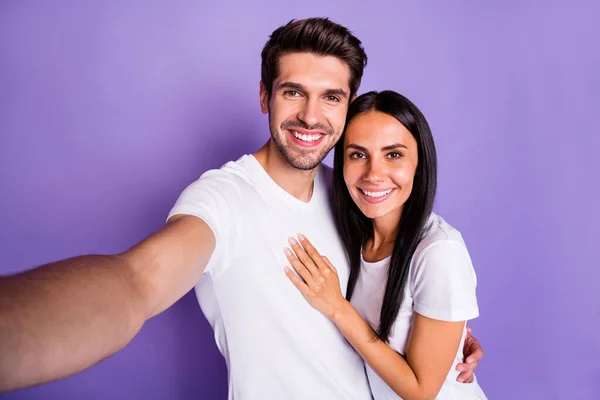 Self-portrait of his he her she nice attractive charming lovely sweet cheerful cheery glad couple spending time vacation holiday hugging isolated on purple violet lilac color pastel background — Stock Photo, Image